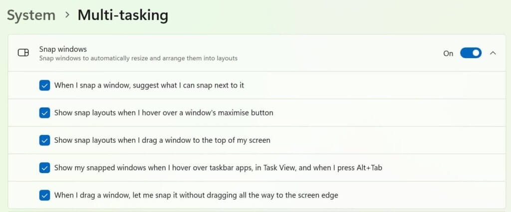 Settings -> System -> Multi-tasking enable/disable snap