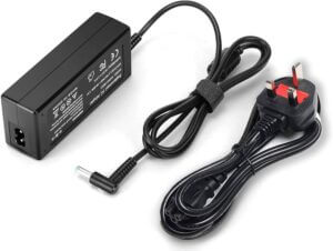 Laptop power supply with non polar IEC C8 socket featured next to UK power cable with IEC C5 power plug