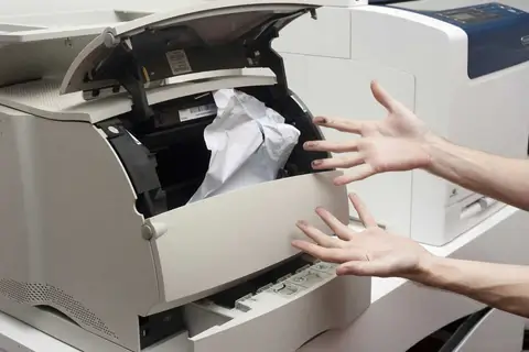 Computer Maintenance - Printers (Image shows a Paper Jam)