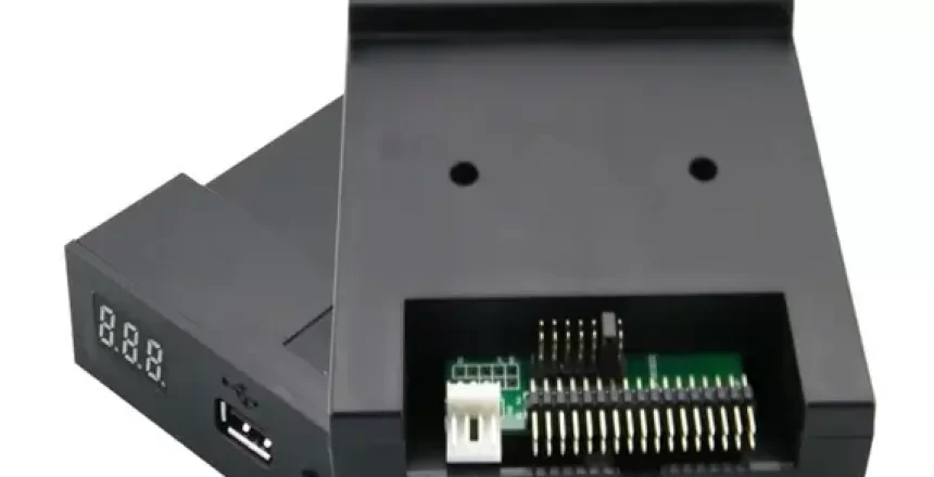 Floppy drive emulator enabling a computer with a floppy drive interface to use a USB memory stick as a stack of floppy drives and the button switches the file on the SD card to simulate a new floppy disk inserted.