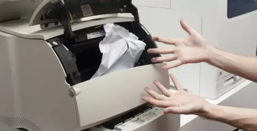 Computer Maintenance - Printers (Image shows a Paper Jam)