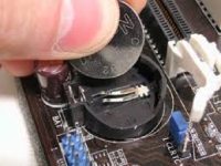CR2032 battery replacement in a desktop motherboard