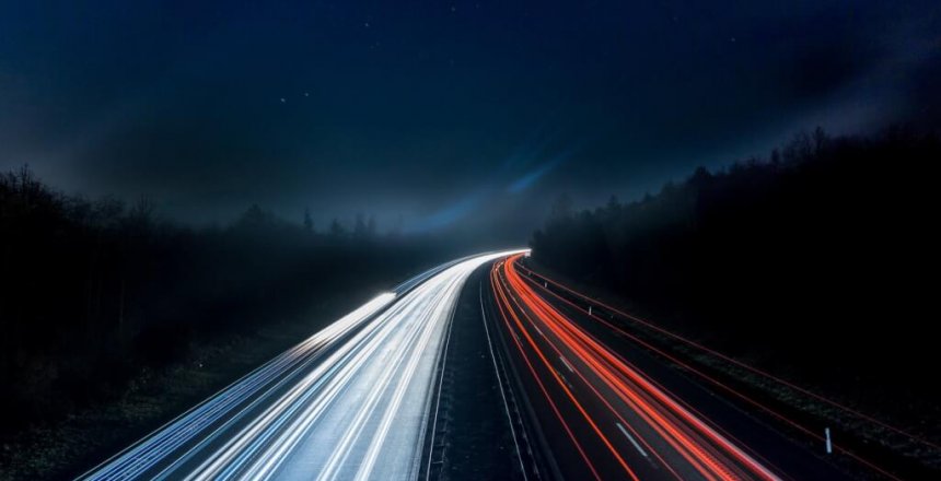 light trails on highway at night